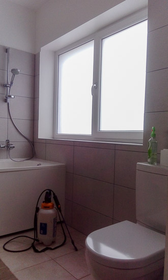 Bathroom glass window film with a frosted etched look