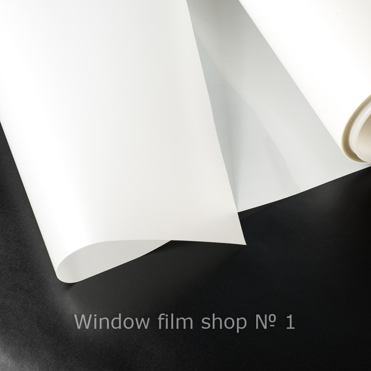 Wet application of self adhesive window tint film with the installation solution