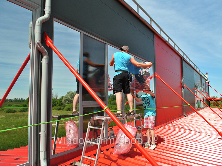 Strata EX 20 mirror film cut to size, ready for installation on a window